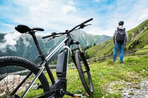 man and bike in the mountains