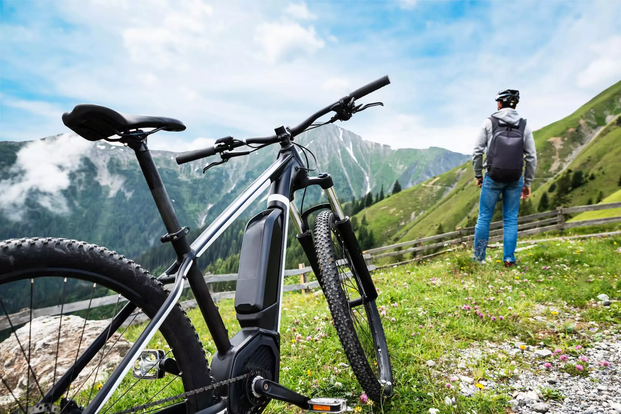 man and bike in the mountains